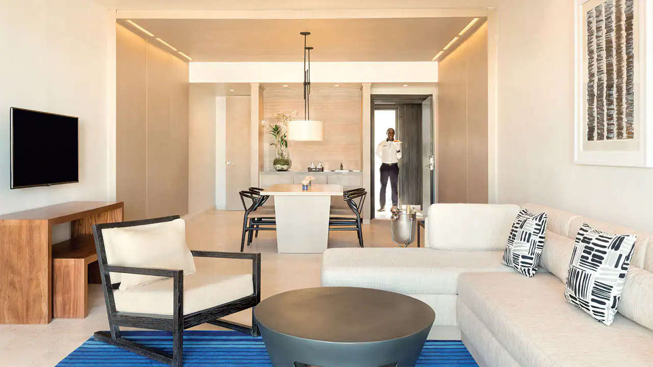 Spacious living and dining area in the Grand Butler Suite at Hyatt Zilara Rose Hall.