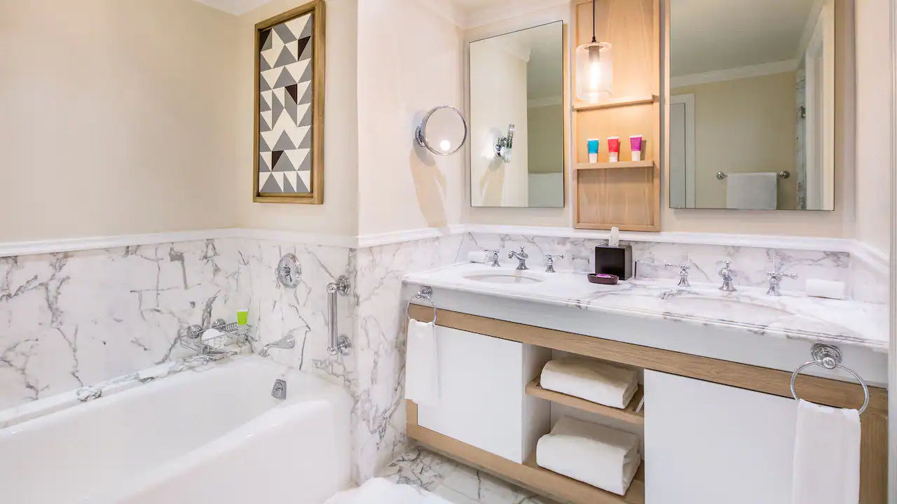 Double room bathroom with marble soaking tub and dual vanity at Hyatt Zilara Rose Hall.