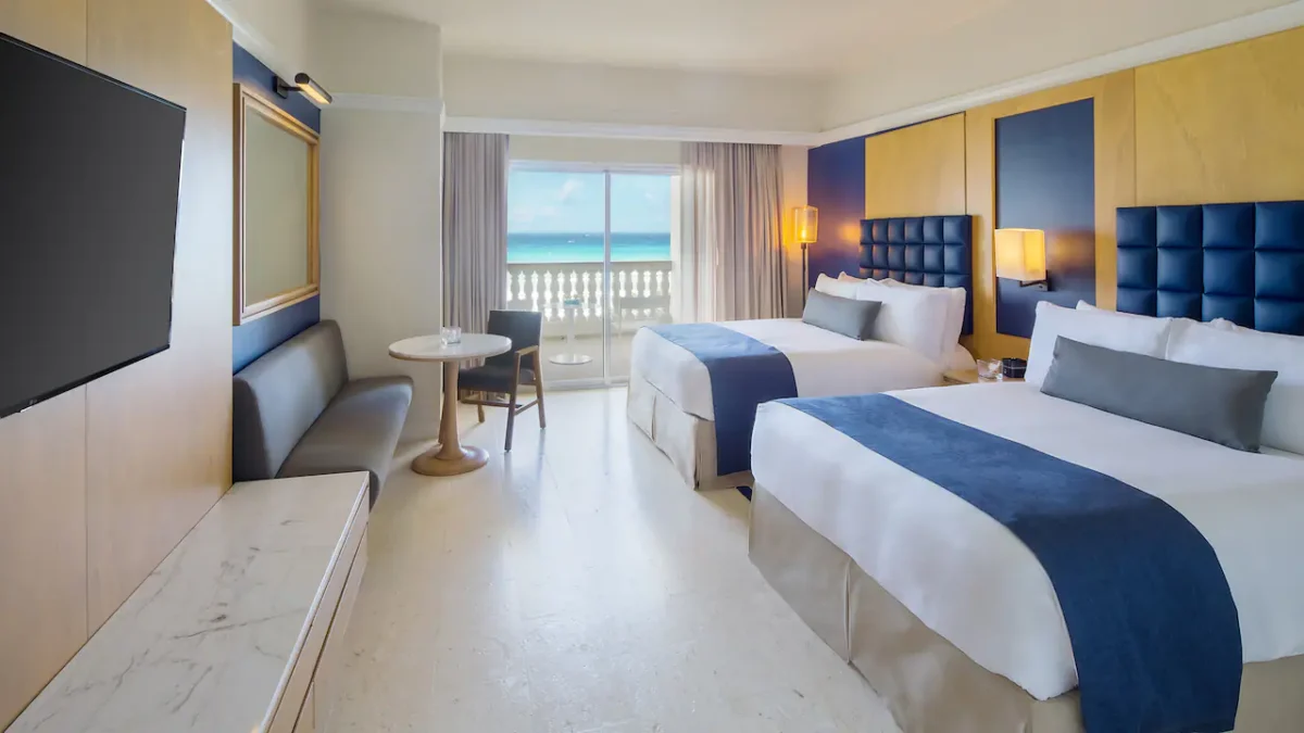 Oceanfront Double room with two queen beds and private balcony at Hyatt Zilara Rose Hall.