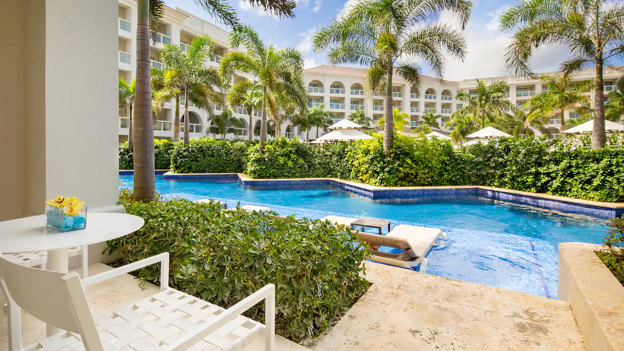 Swim-Up Double terrace with direct access to a semi-private pool at Hyatt Zilara Rose Hall.