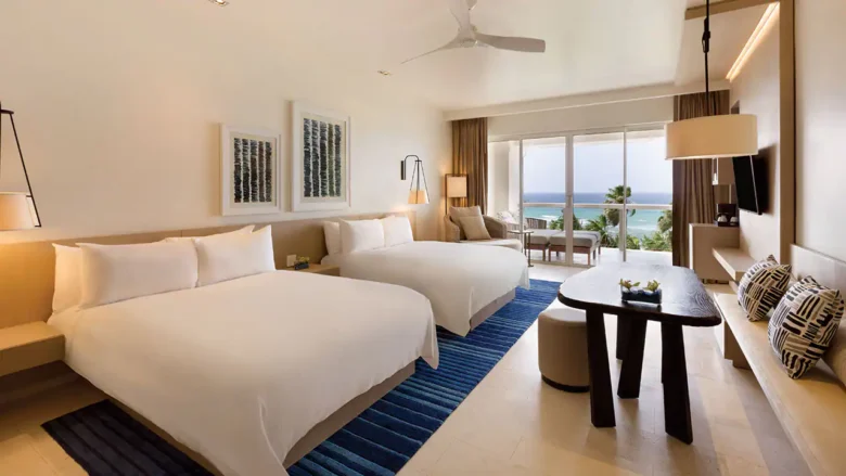 Junior Suite Double with two queen beds and private terrace at Hyatt Zilara Rose Hall.