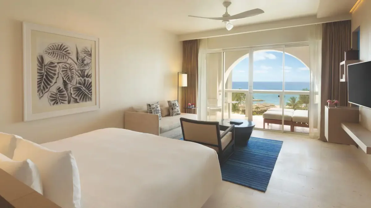 Oceanfront Junior Suite King with private terrace and Caribbean Sea views at Hyatt Zilara Rose Hall.