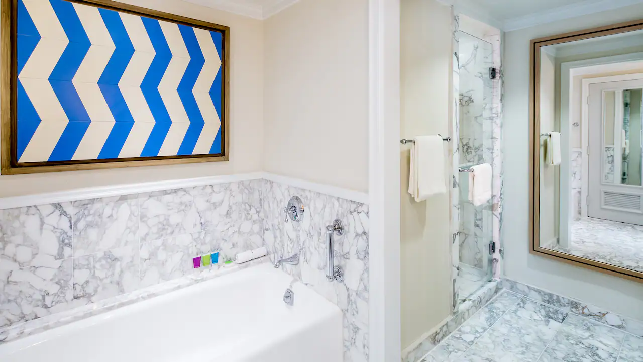 One Bedroom Swim-Up Suite bathroom with soaking tub and walk-in shower at Hyatt Zilara Rose Hall.