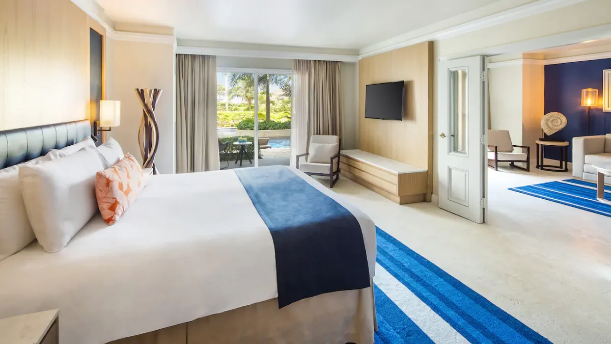 King bedroom in the One Bedroom Swim-Up Suite at Hyatt Zilara Rose Hall.