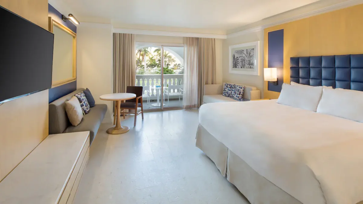 Resort View King room with plush king bed and private terrace at Hyatt Zilara Rose Hall.