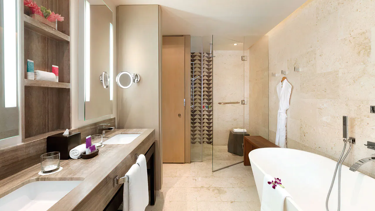 Swim-Up Junior Suite bathroom with soaking tub and rain shower at Hyatt Zilara Rose Hall.